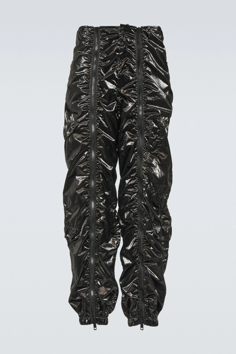 Givenchy Technical Cargo Pants in black, featuring zipper fly, elasticated cuffs, and a unique shiny finish.
