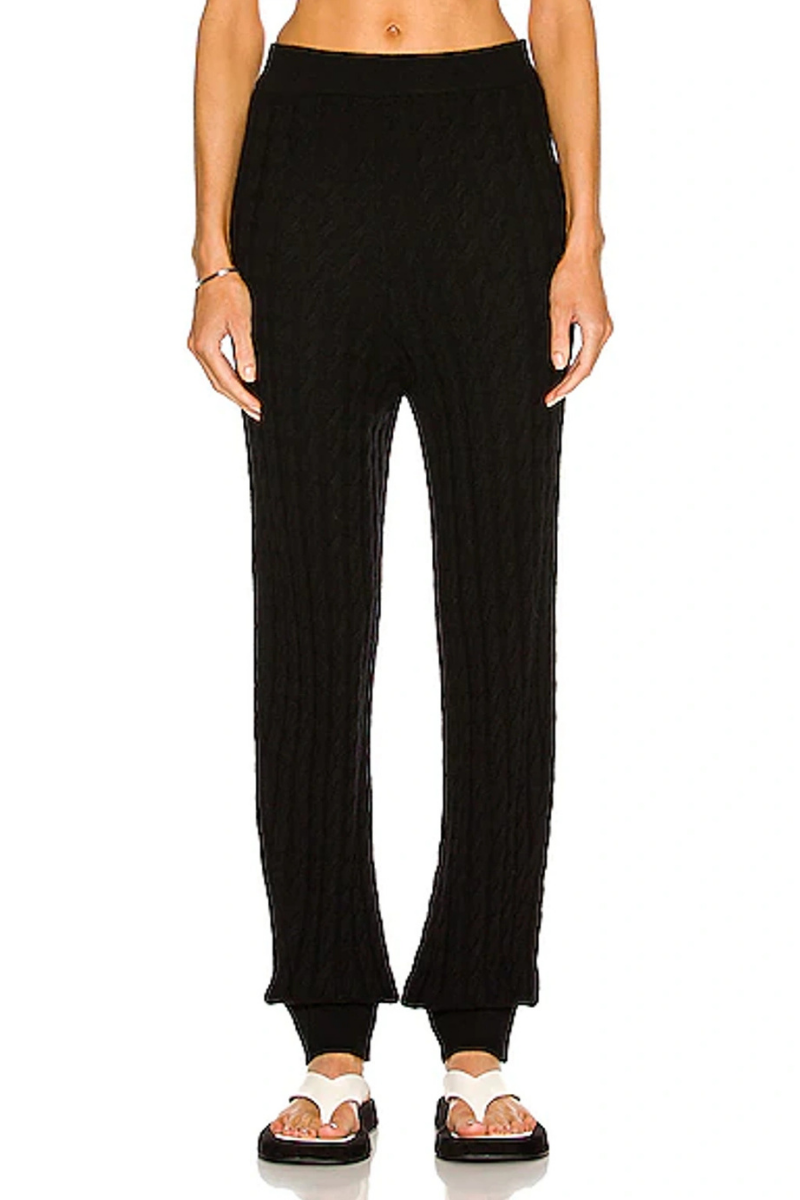 Toteme Cashmere-Blend Pants in black, showcasing a sleek, minimalist design with ribbed texture and comfortable fit.