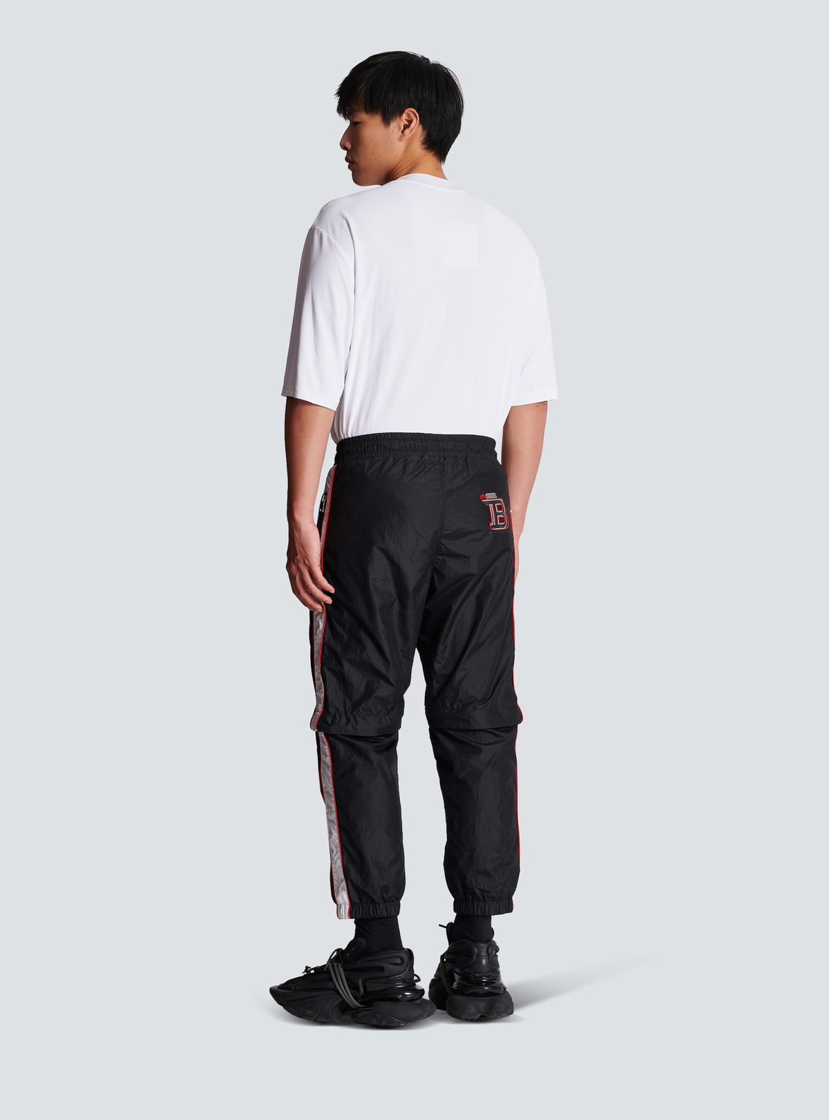 BALMAIN MEN'S BLACK NYLON CONVERTIBLE TRACK PANTS