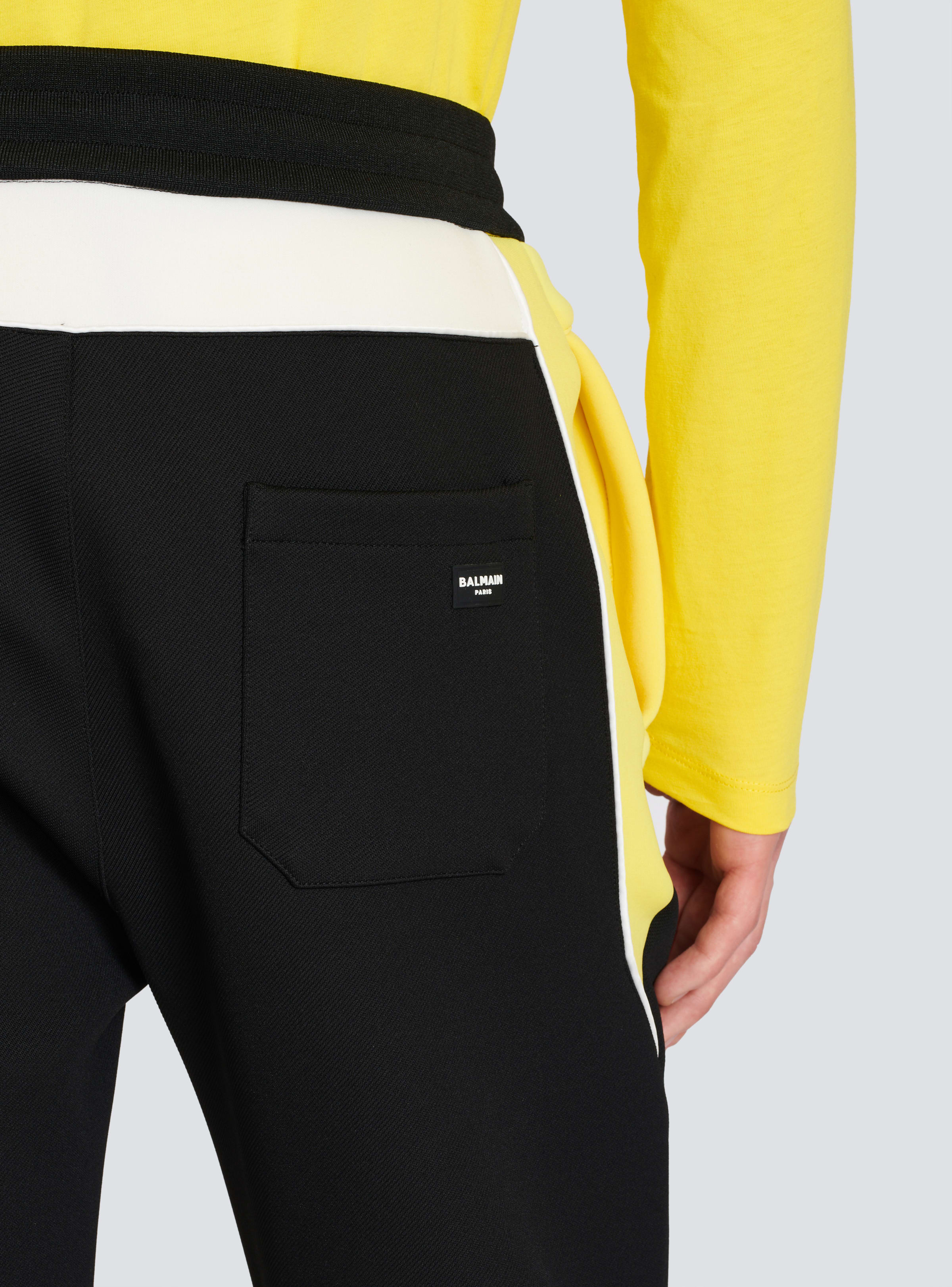 BALMAIN MEN'S BLACK YELLOW NEOPRENE PANELED TROUSERS
