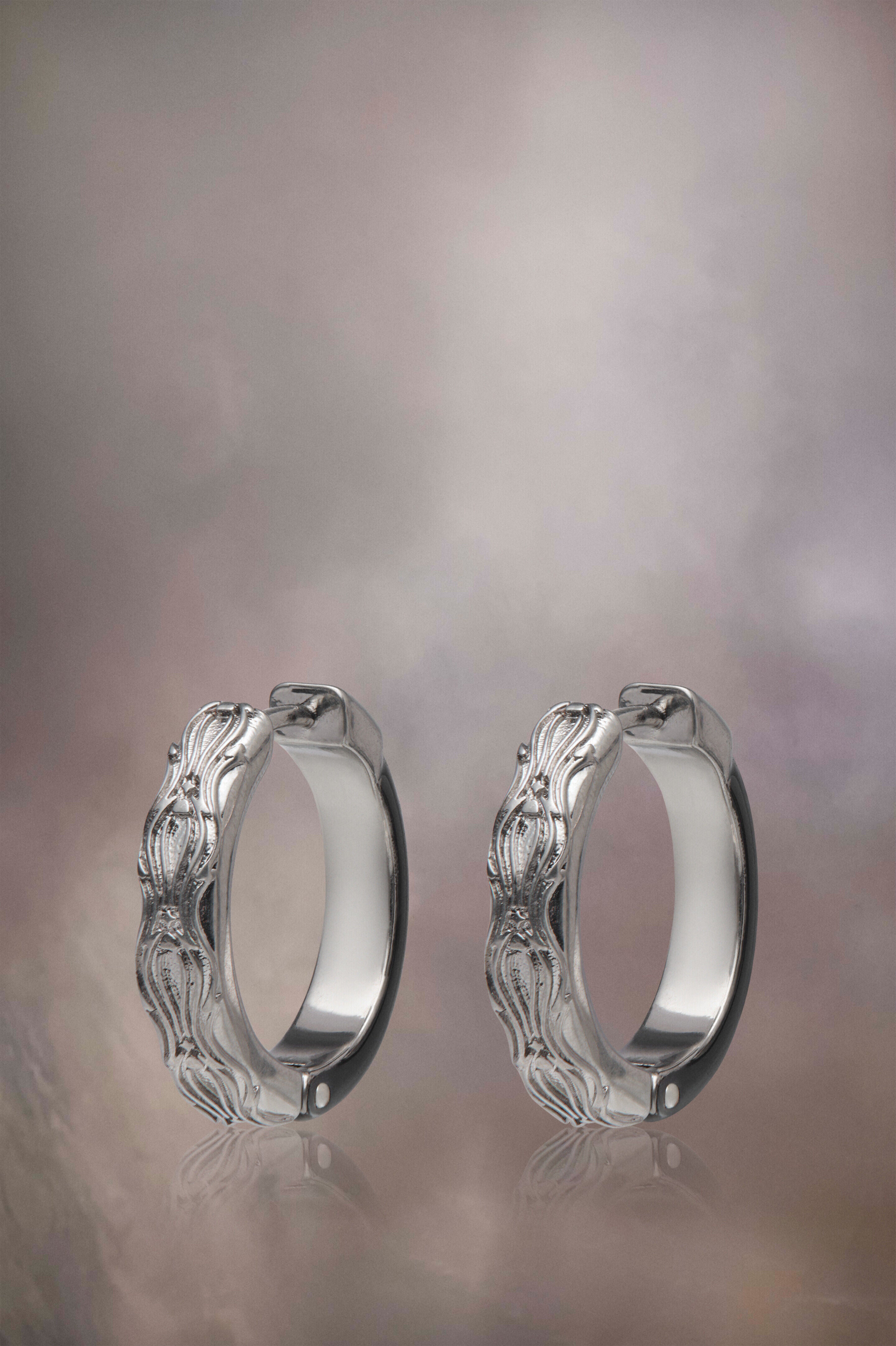 MAISON MARGIELA MEN'S BLACK HOOP EARRINGS WITH STAR DETAIL