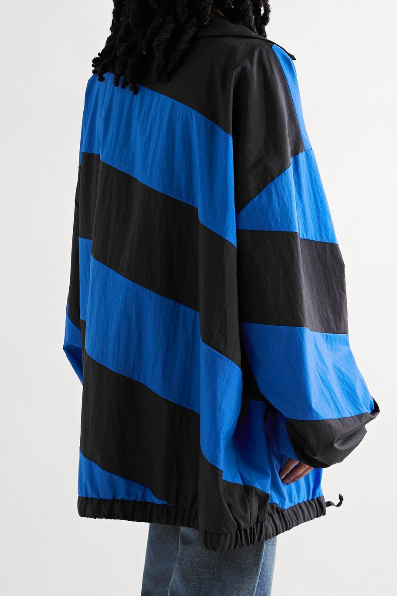 Marni Oversized Striped Nylon Jacket in blue and black, featuring a drawstring hem and oversized cut.