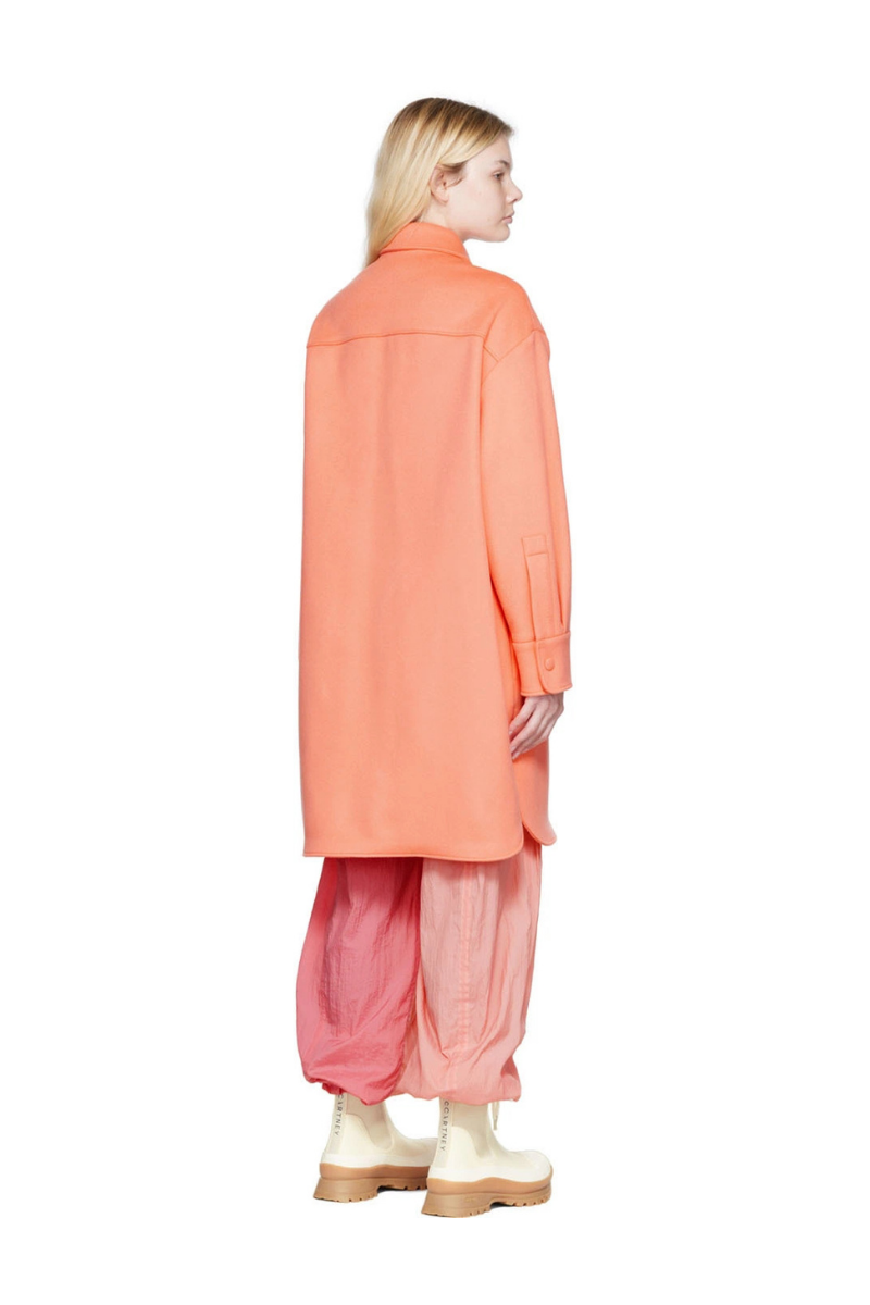 Stella McCartney Kerry Coat in Orange, back view showcasing the sherbet orange wool flannel design.