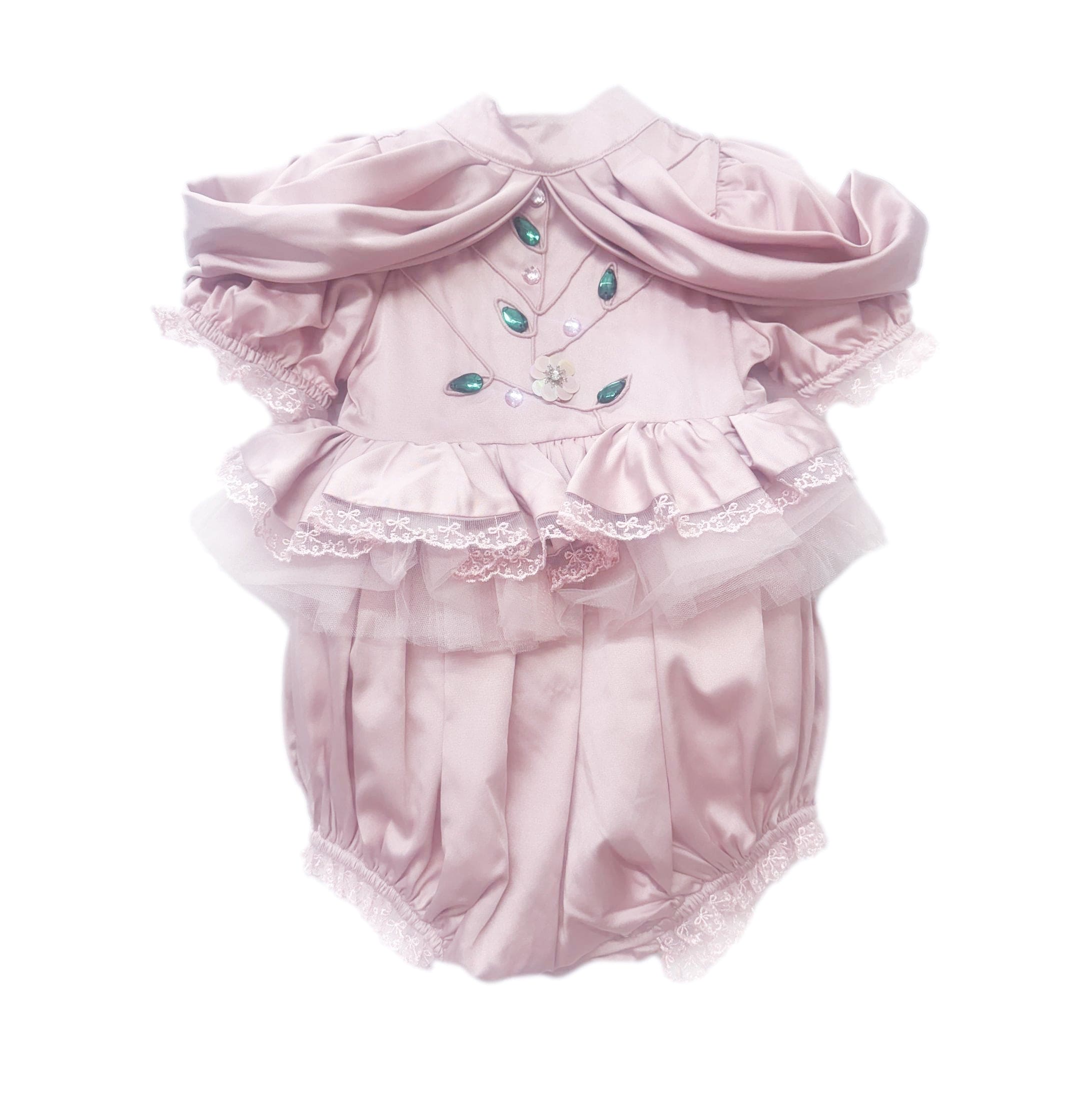 Pink satin ballerina romper for babies featuring delicate tulle lace, emerald green embellishments, and draped sleeves for an elegant special occasion look.