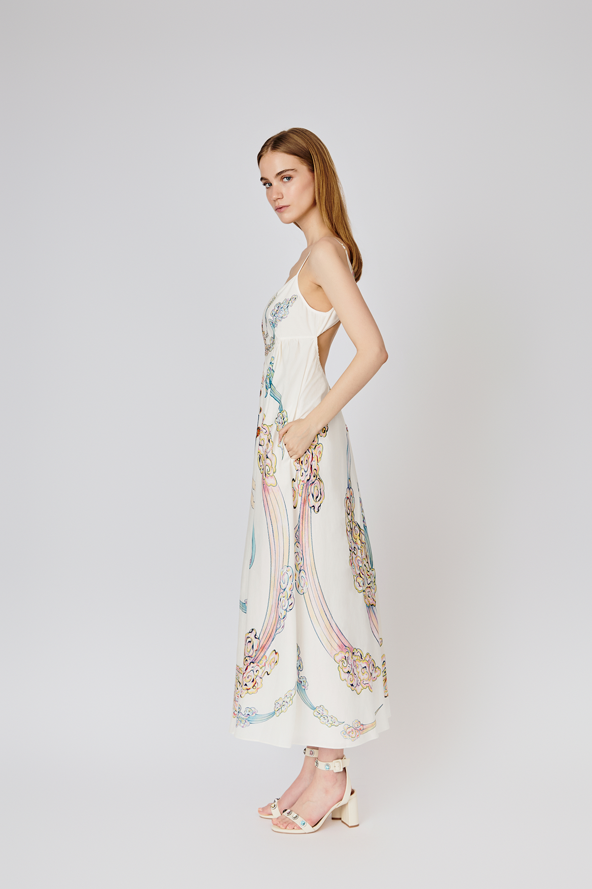 Du & Berry white midi summer dress with colorful pattern and spaghetti straps worn by model