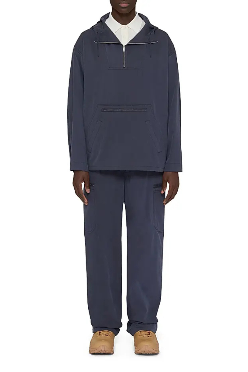 Givenchy Plage Cargo Pants in Ozone Washed Poplin worn with a matching navy top, showcasing the stylish ensemble.