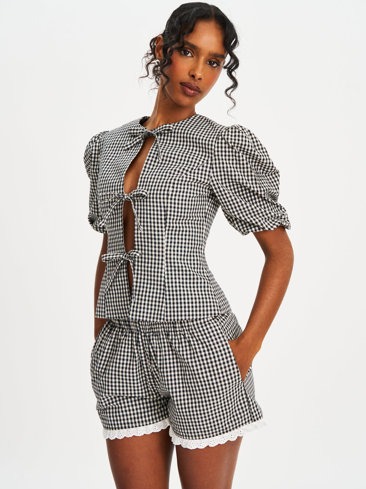 Qusayla Black Gingham Cotton Bubble Sleeve Bowtie Top