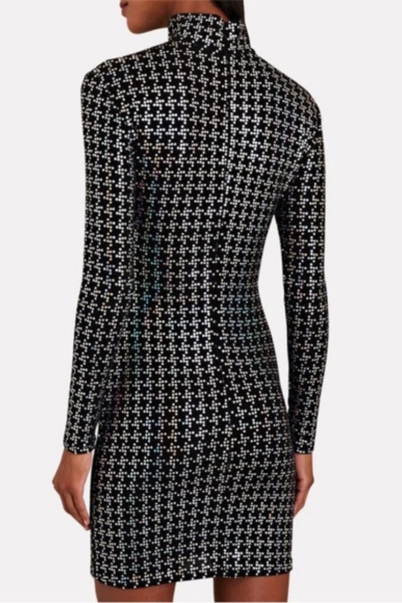 Model wearing L‘AGENCE Cher Black Sparkle Dress, showcasing the back view with metallic sparkle pattern.