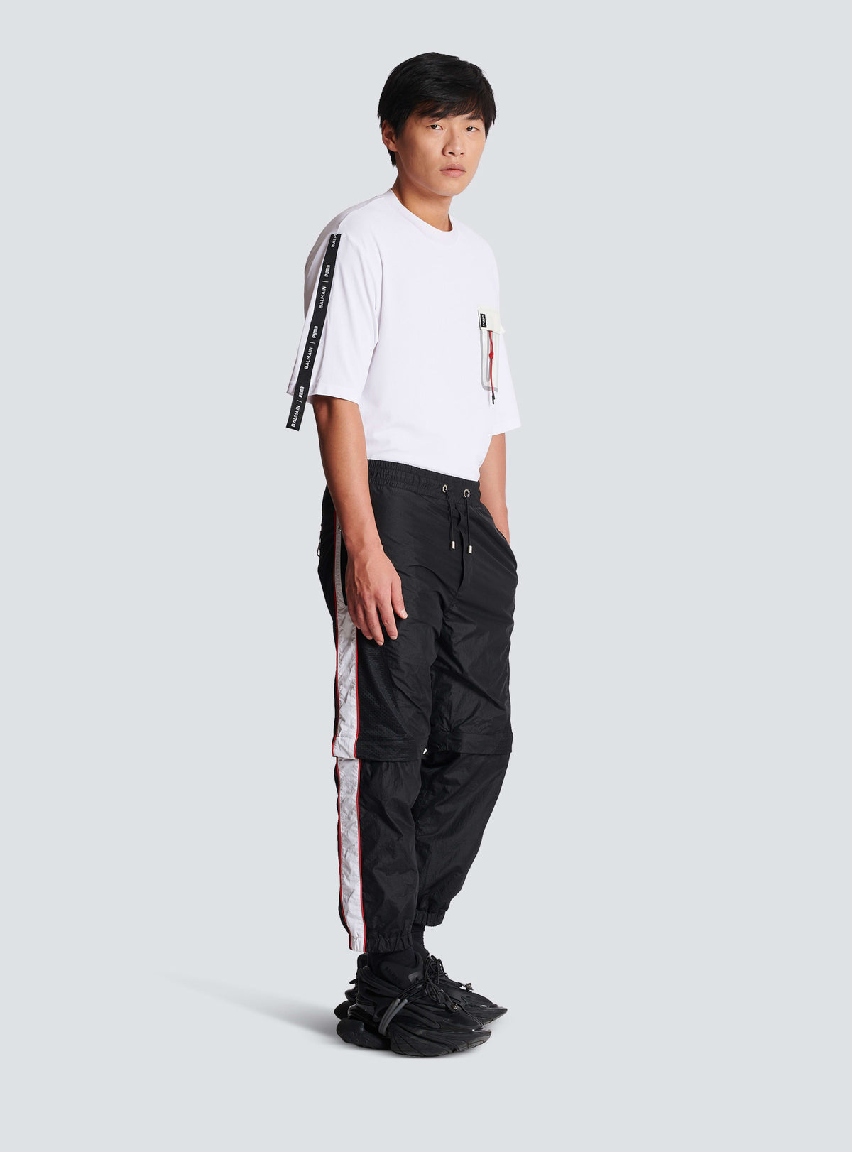 BALMAIN MEN'S BLACK NYLON CONVERTIBLE TRACK PANTS