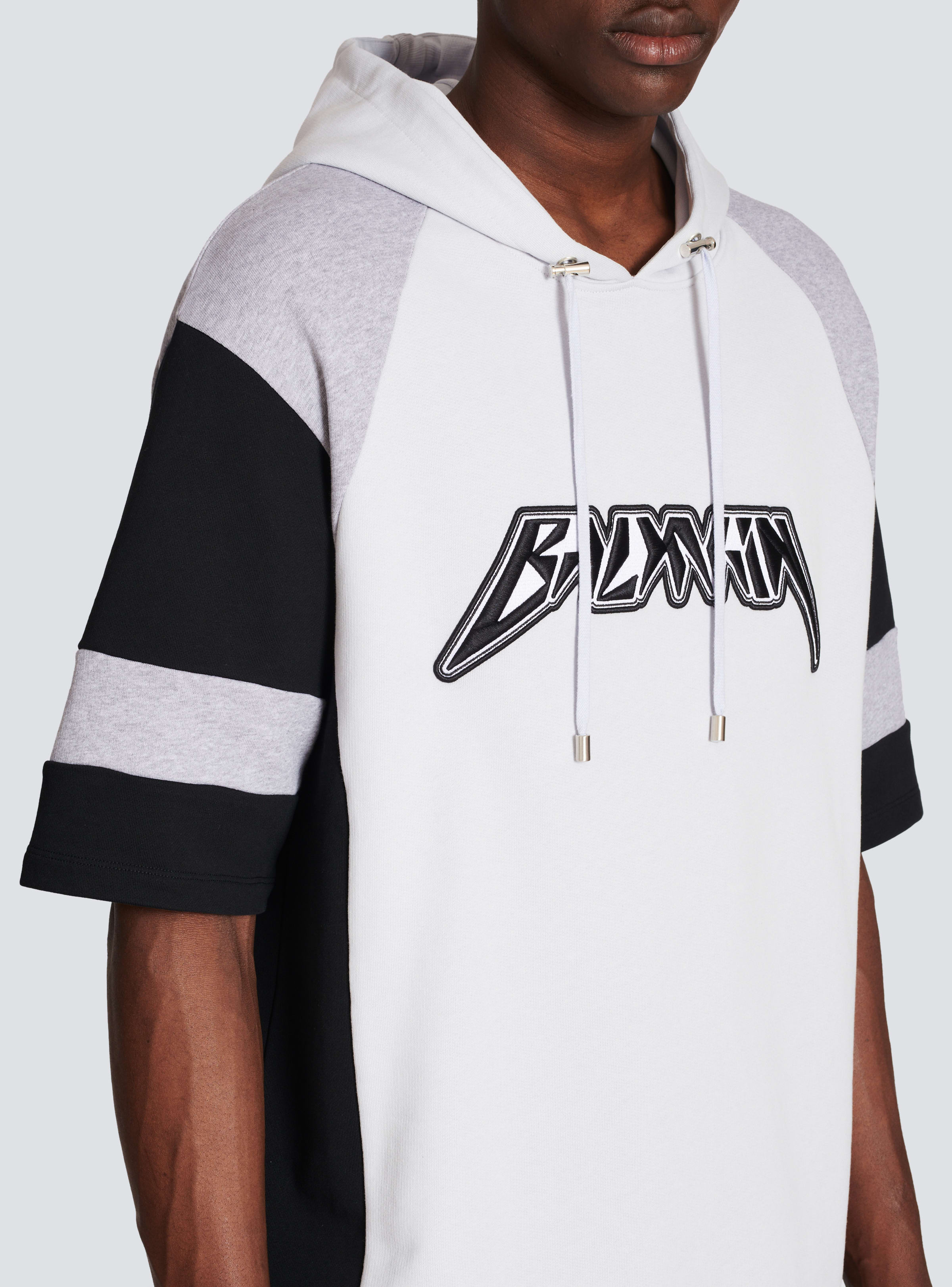 BALMAIN MEN'S LIGHT BLUE BLACK OVERSIZED HOODIE