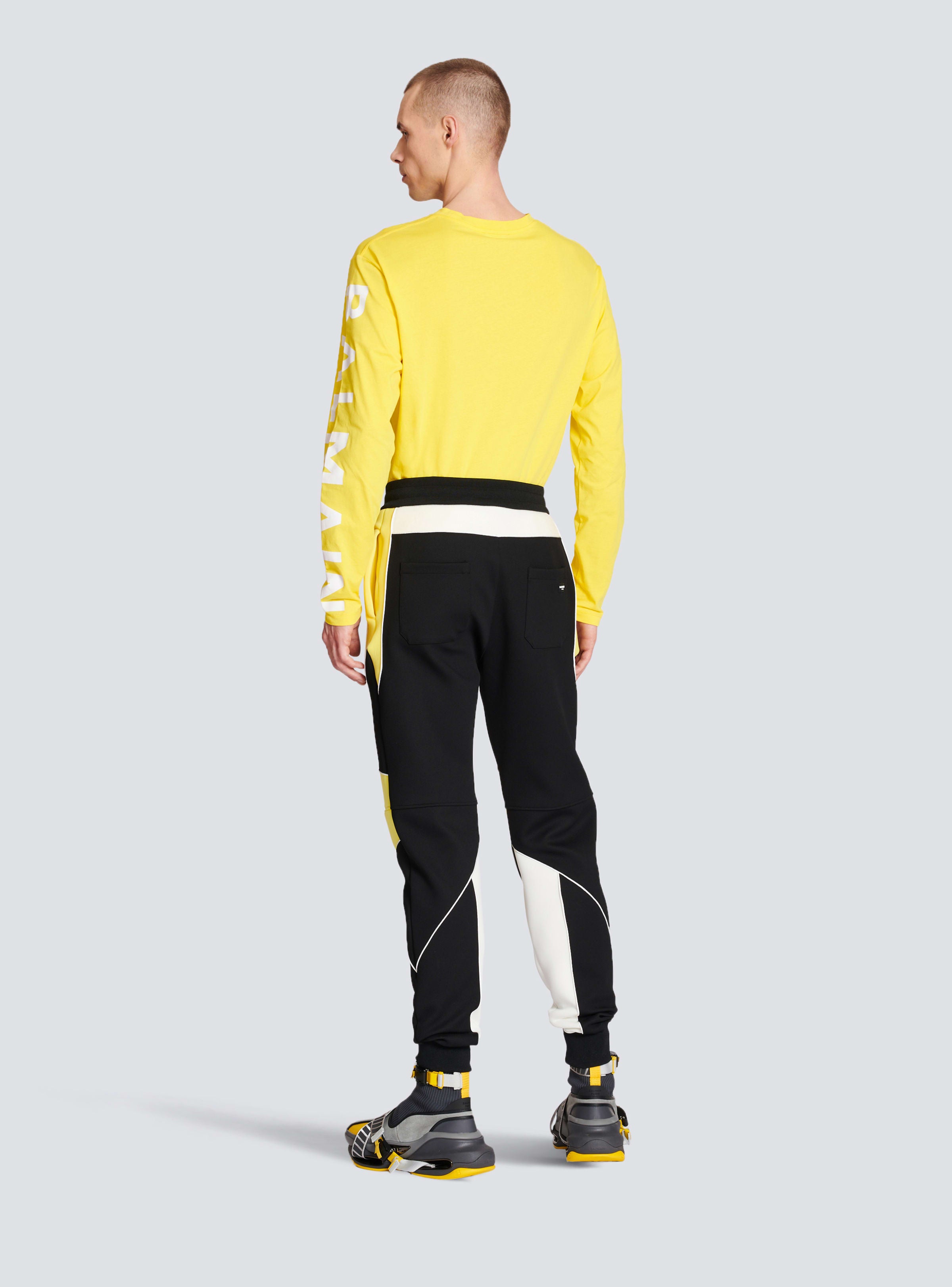 BALMAIN MEN'S BLACK YELLOW NEOPRENE PANELED TROUSERS