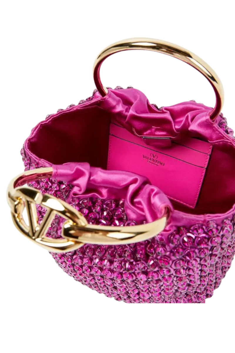 Valentino Garavani Carry Secrets Small embellished bucket bag in Fucsia