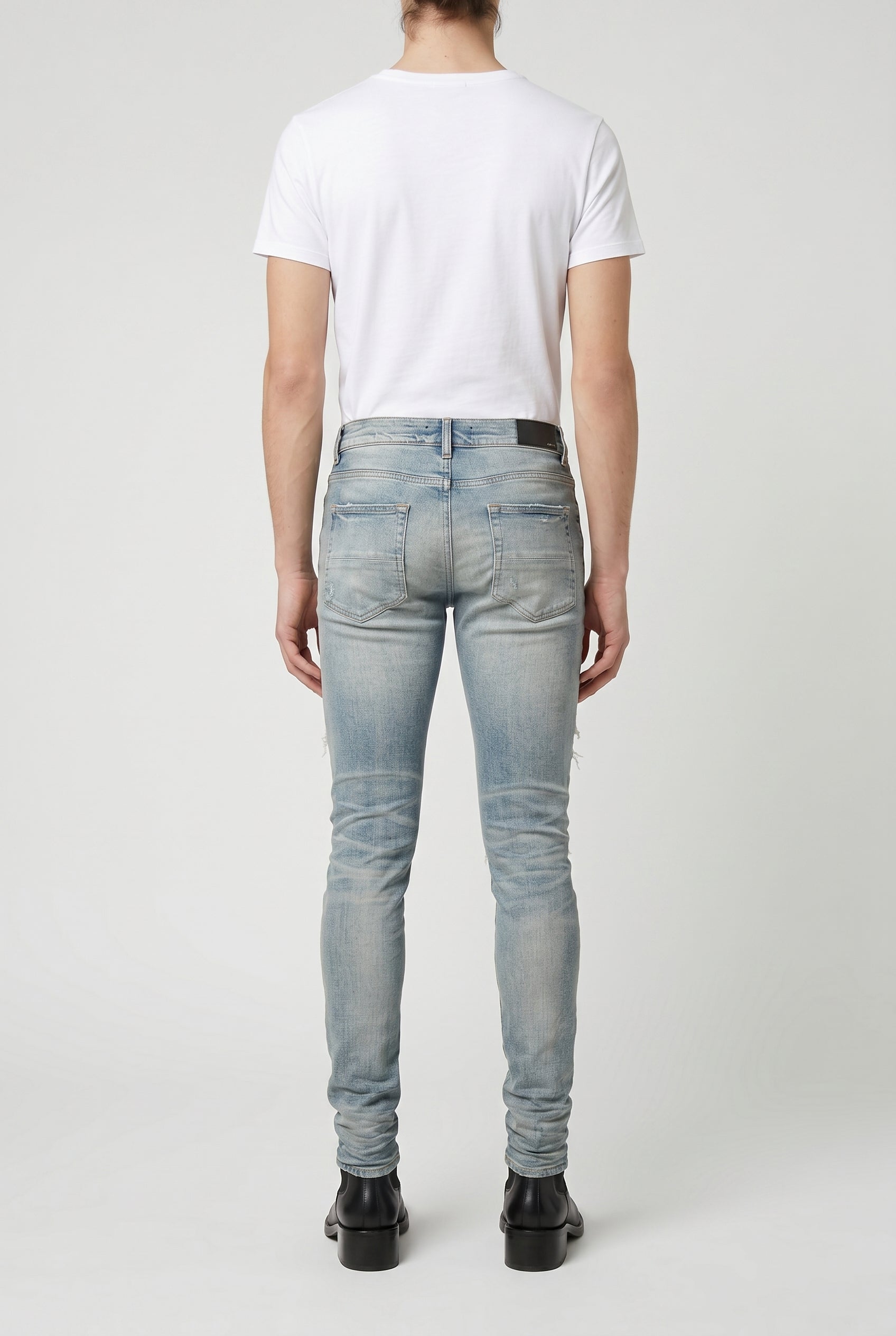 AMIRI MEN'S LIGHT BLUE RIPPED JEANS