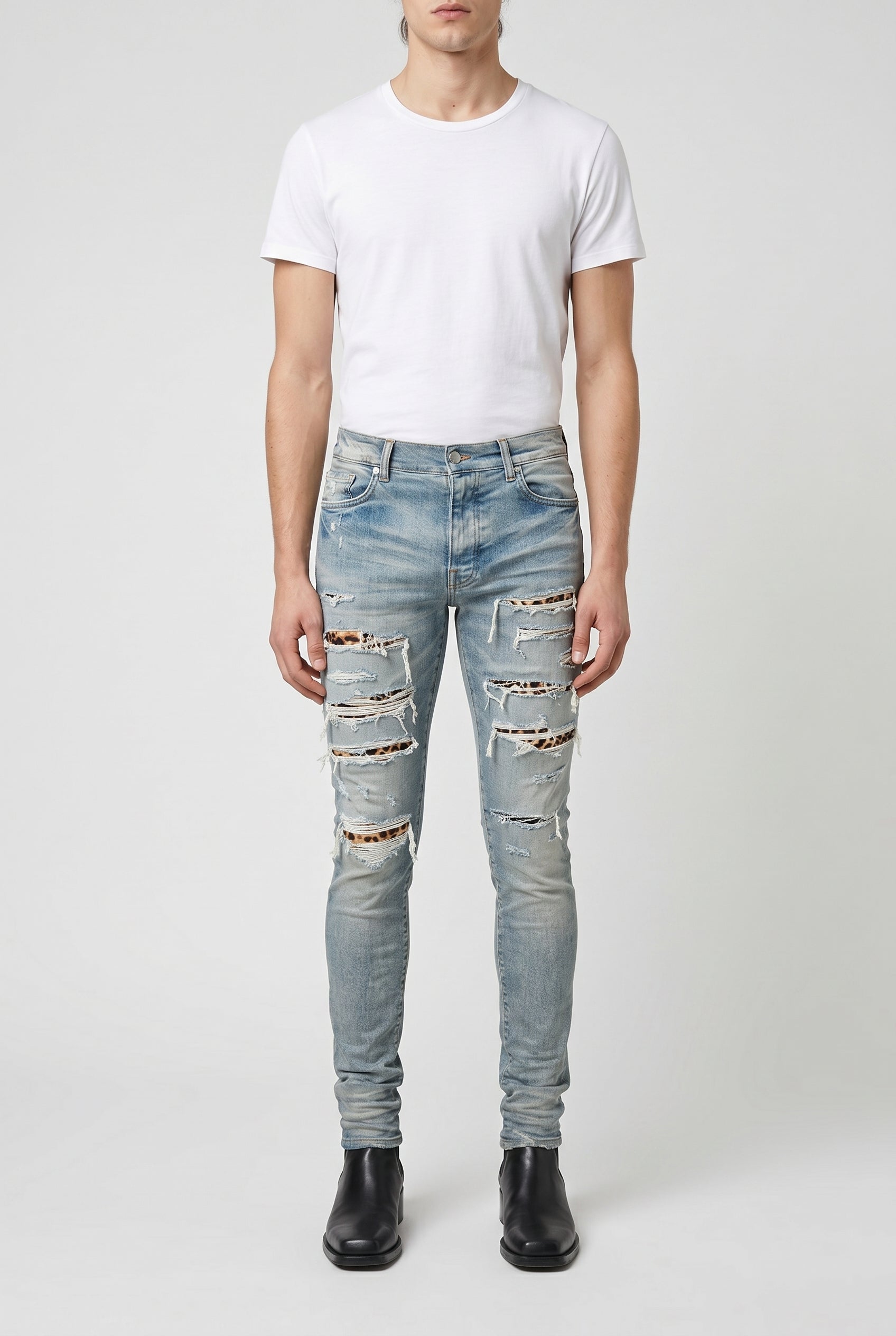 AMIRI MEN'S LIGHT BLUE RIPPED JEANS