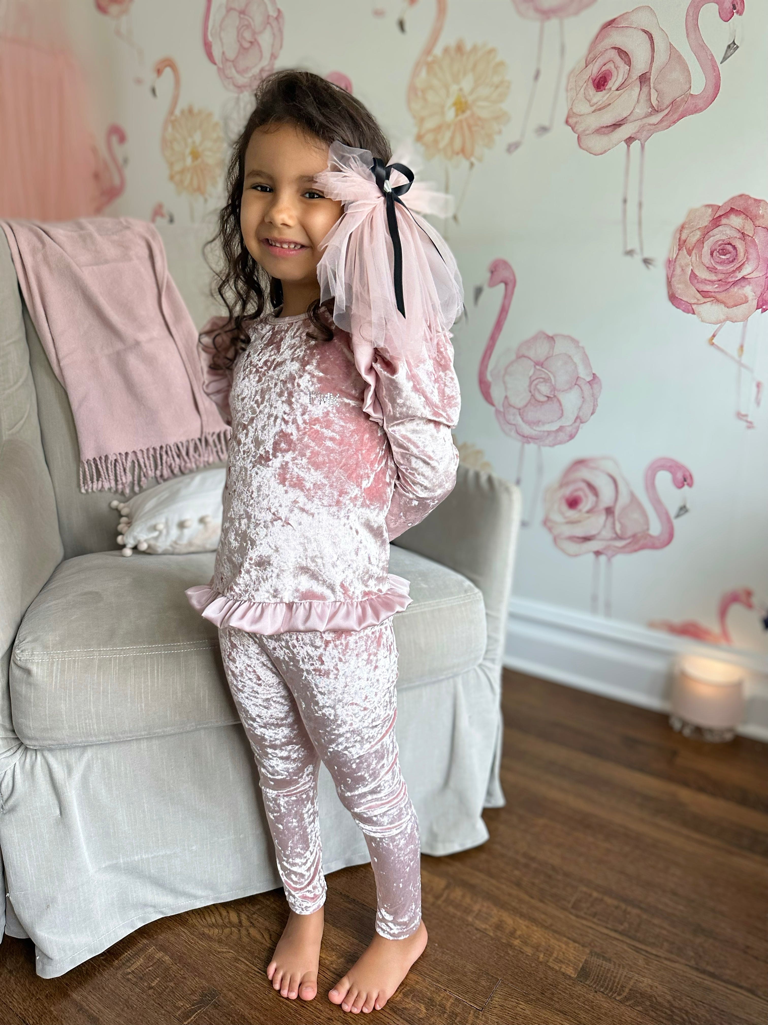 Close up view of pink velour lounge set for girls highlighting plush velvet fabric and ruffle shoulder design