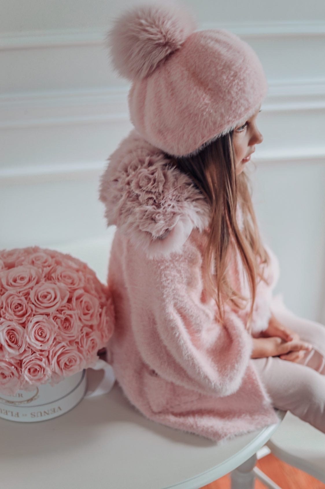 Milana Rose Beret styled on young girl with matching pink faux fur jacket and cozy winter aesthetic.