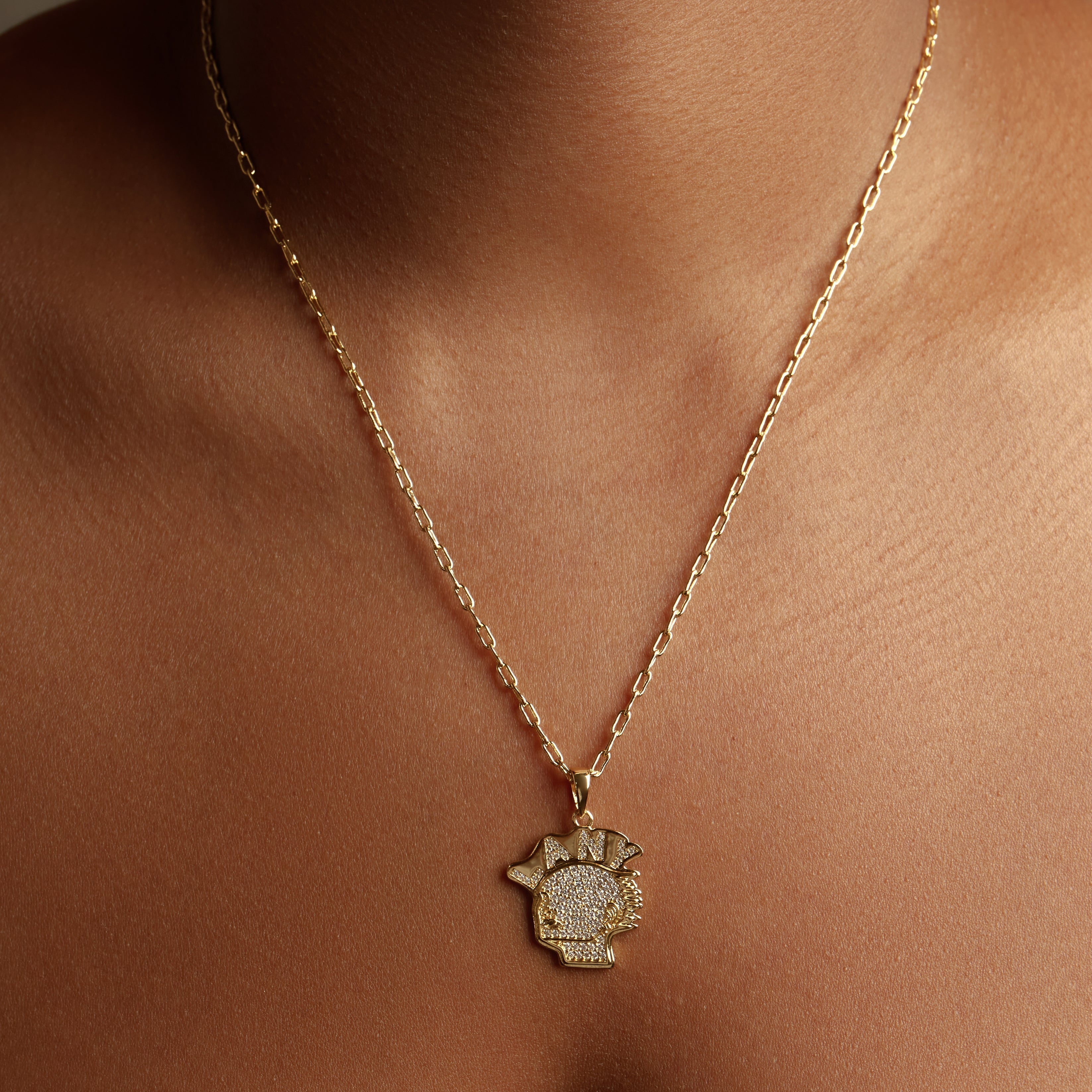 iced out lany logo gold necklace